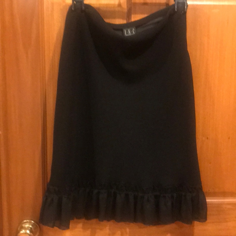 Black skirt.  Inc